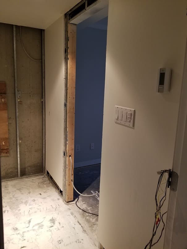 doorway Before - High End Finishes Yaletown Condo - Bathroom Renovation
