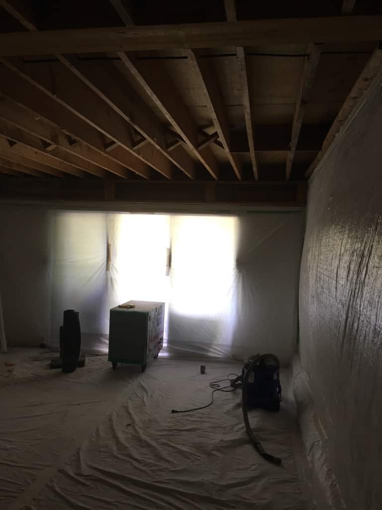 Asbestos abatement progress of Kitsilano living room